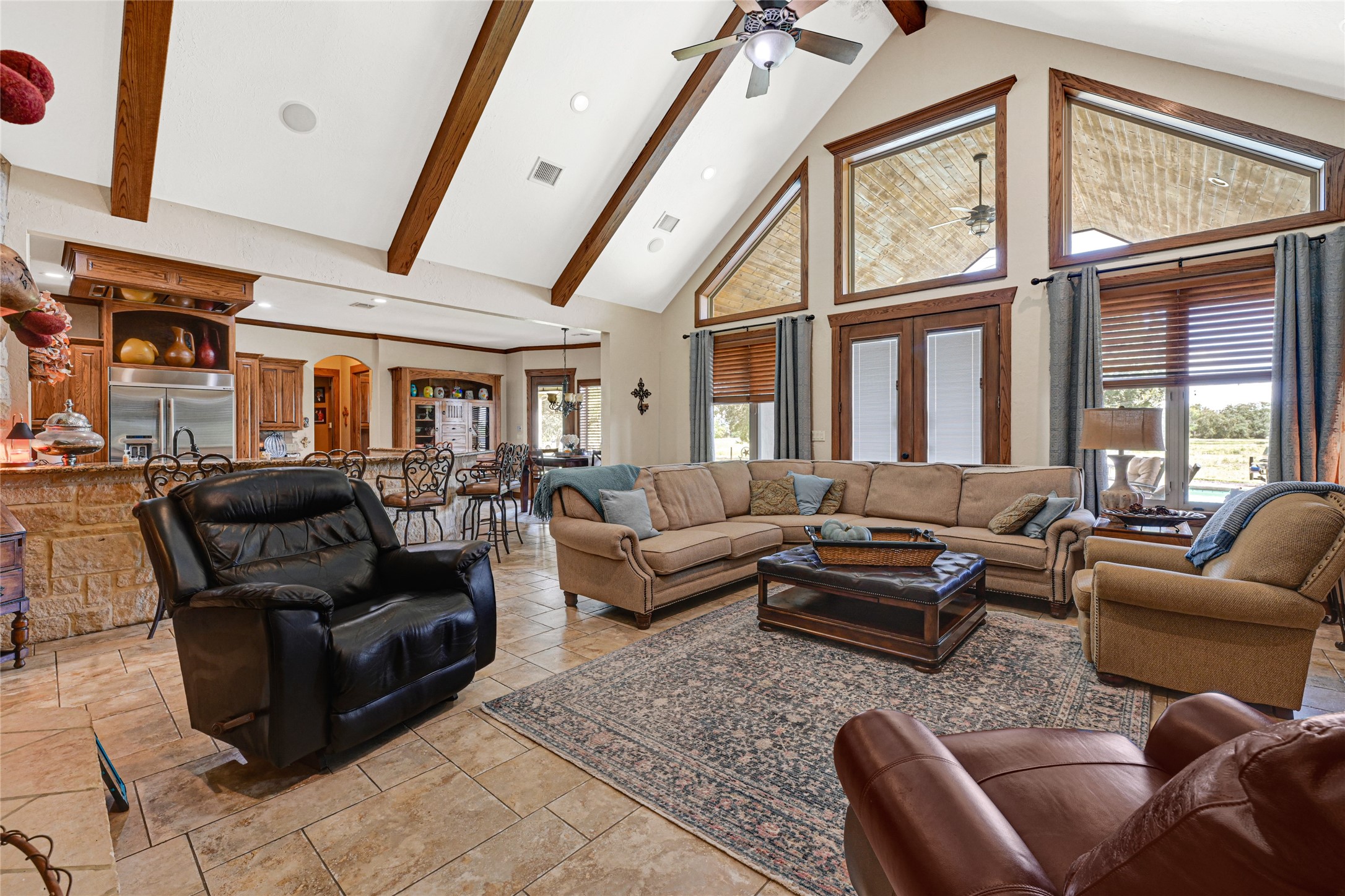 4800 Katy Hockley Road Katy, TX 77493 - Photo 10 of 24 a living room with furniture ceiling fan and a rug
