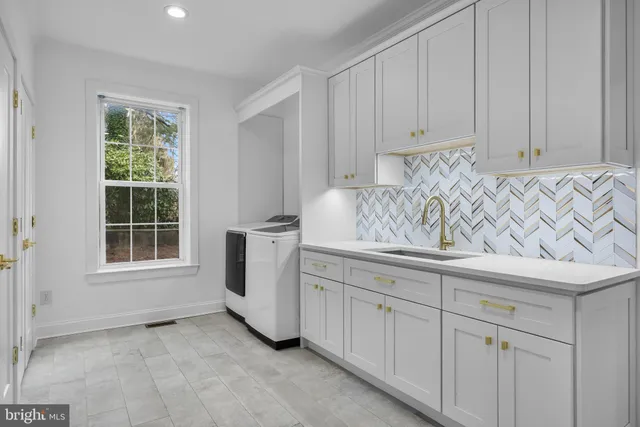 a view of kitchen with furniture and window