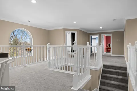 a view of an entryway with stairs