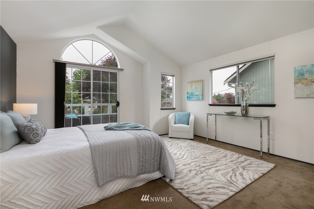 741 North 87th Street Seattle, WA 98103 - Photo 13 of 20 a bedroom with a bed and a dresser