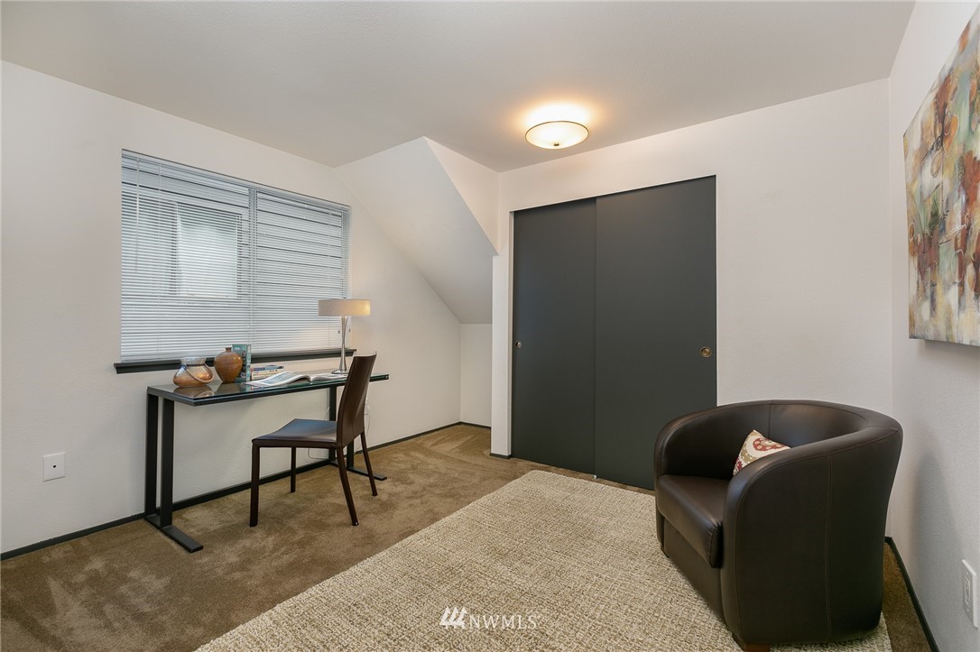 741 North 87th Street Seattle, WA 98103 - Photo 17 of 20 a work room with furniture and a window