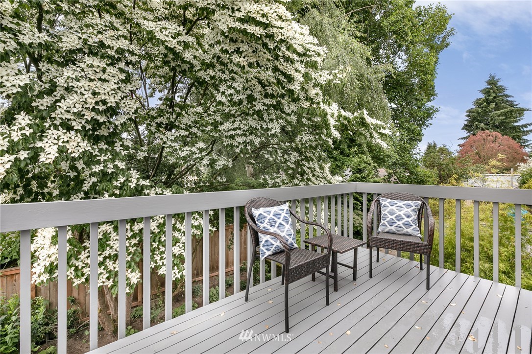 741 North 87th Street Seattle, WA 98103 - Photo 10 of 20 a view of balcony with wooden floor and fence