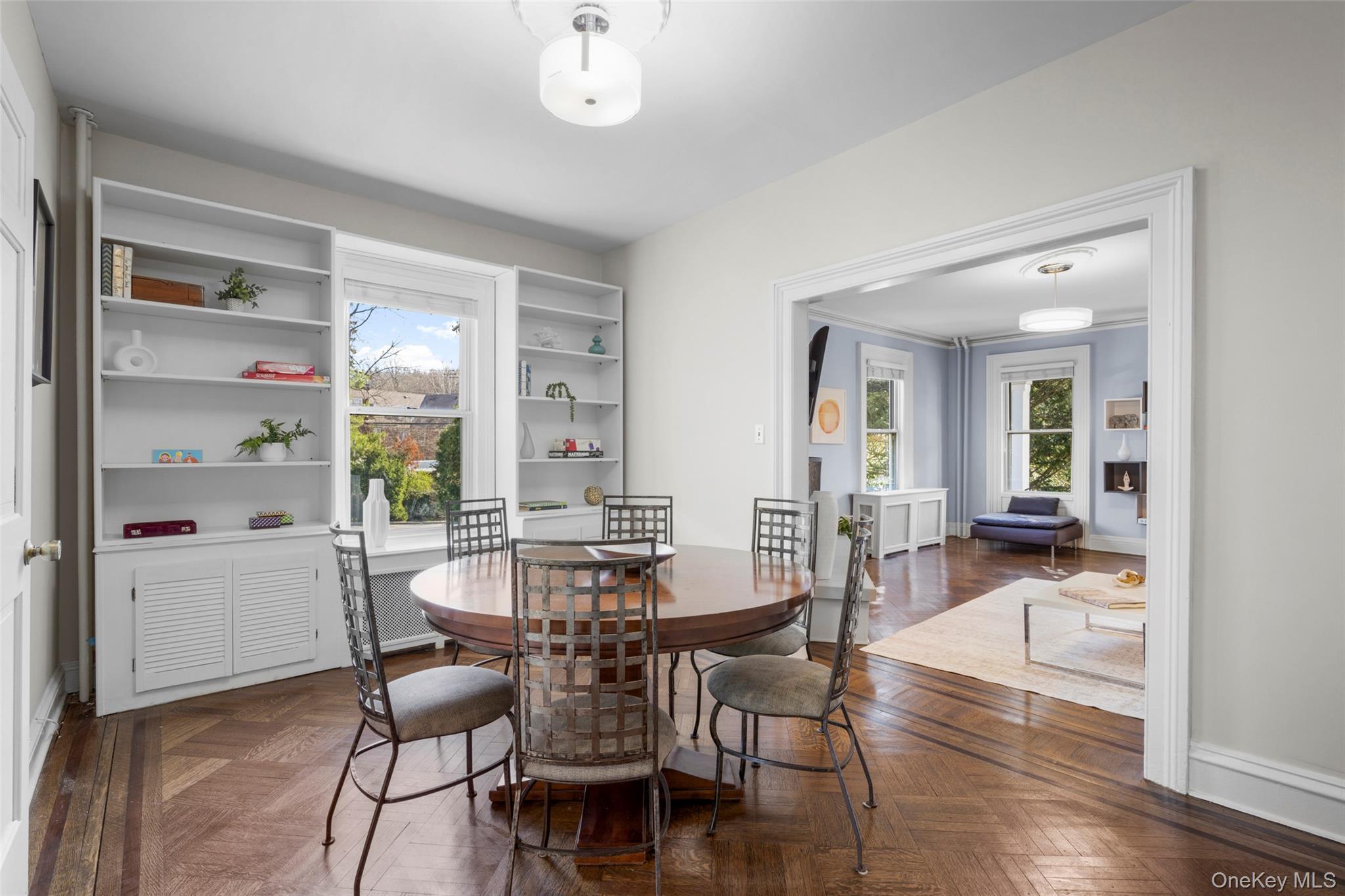 644 Fort Hill Road Scarsdale, NY 10583 - Photo 11 of 42 a view of a dining room with furniture and wooden floor