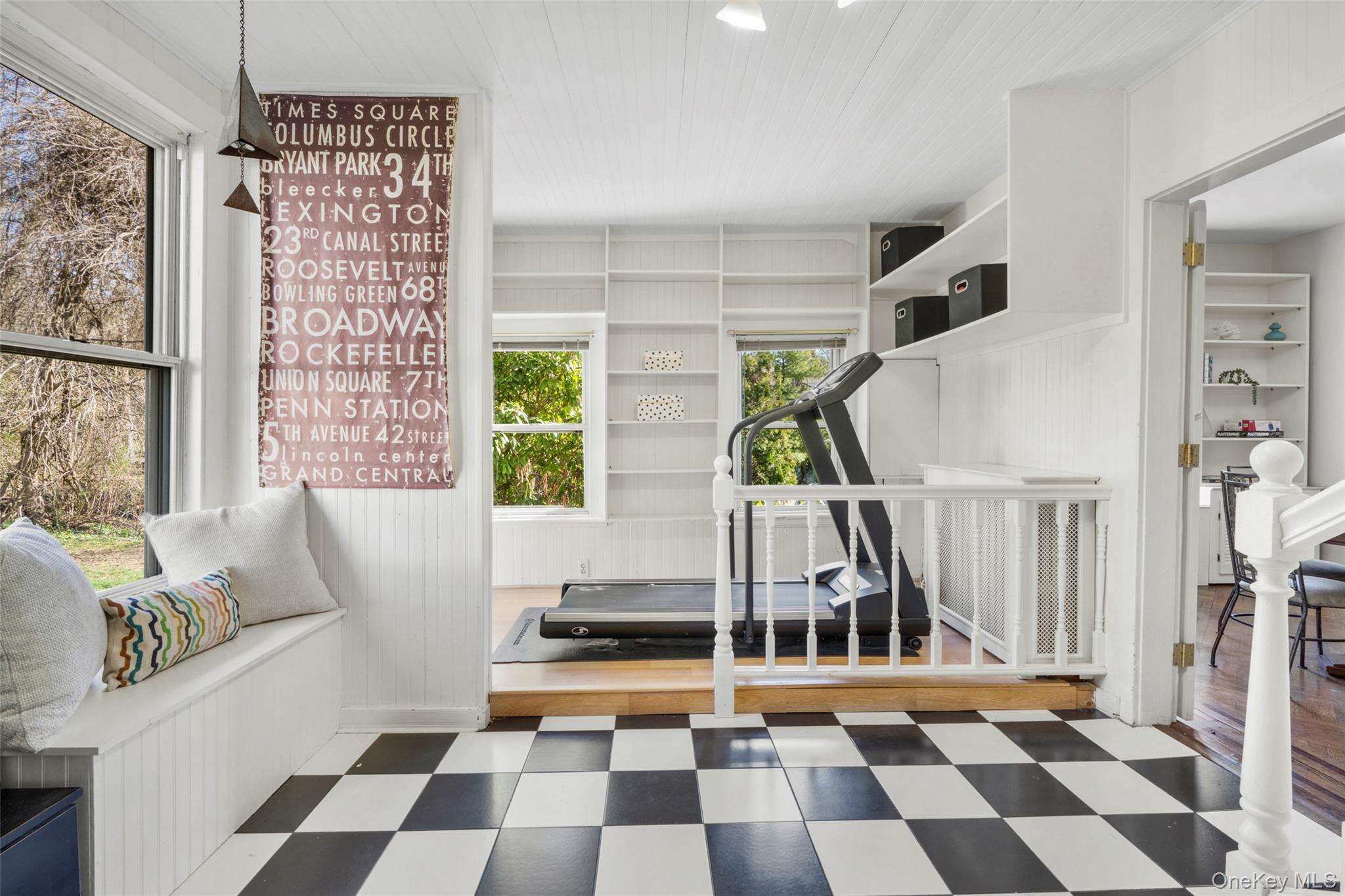 644 Fort Hill Road Scarsdale, NY 10583 - Photo 12 of 42 a room with lots of windows and white walls