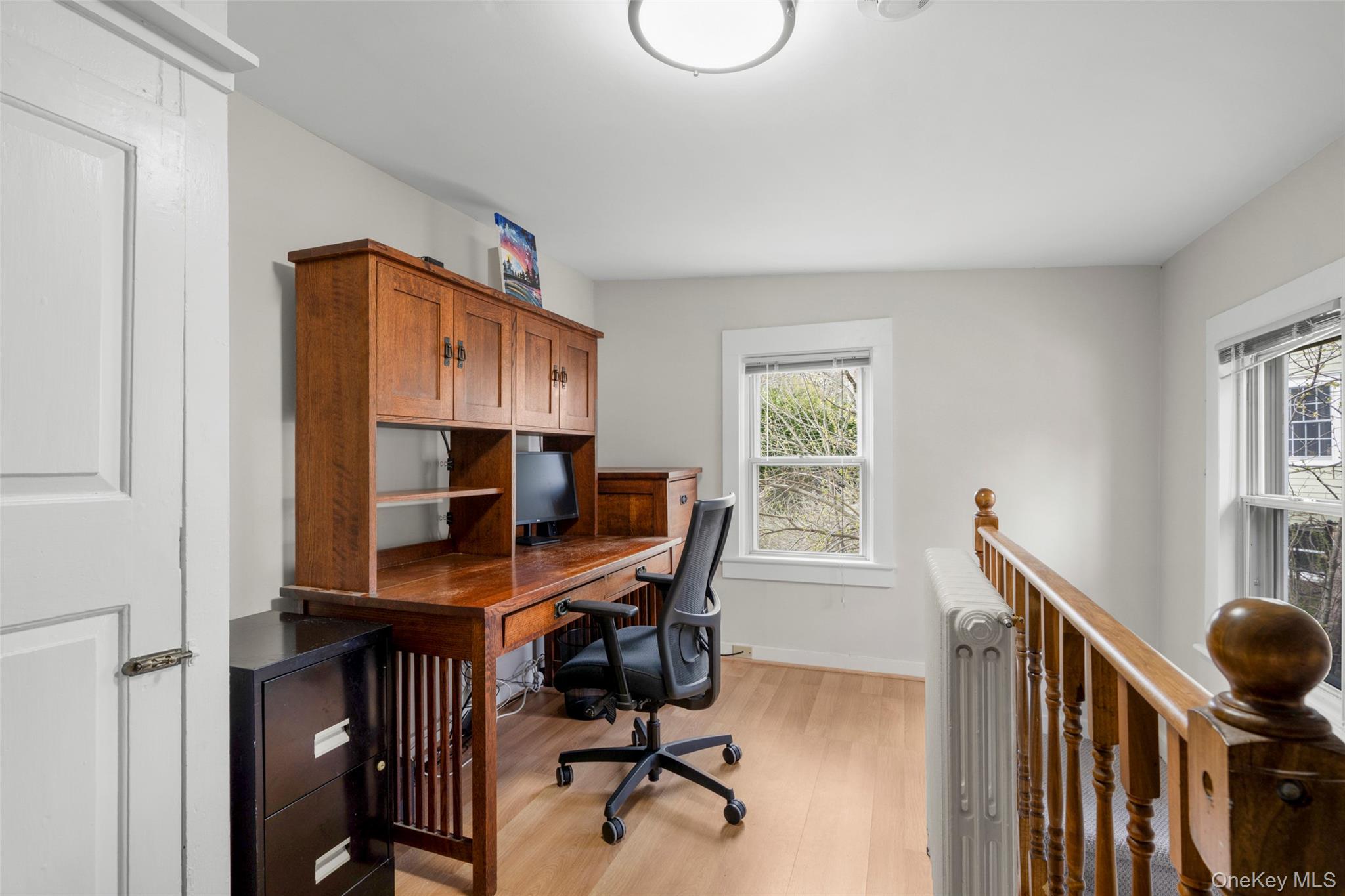 644 Fort Hill Road Scarsdale, NY 10583 - Photo 22 of 42 a view of a workspace with furniture and a window