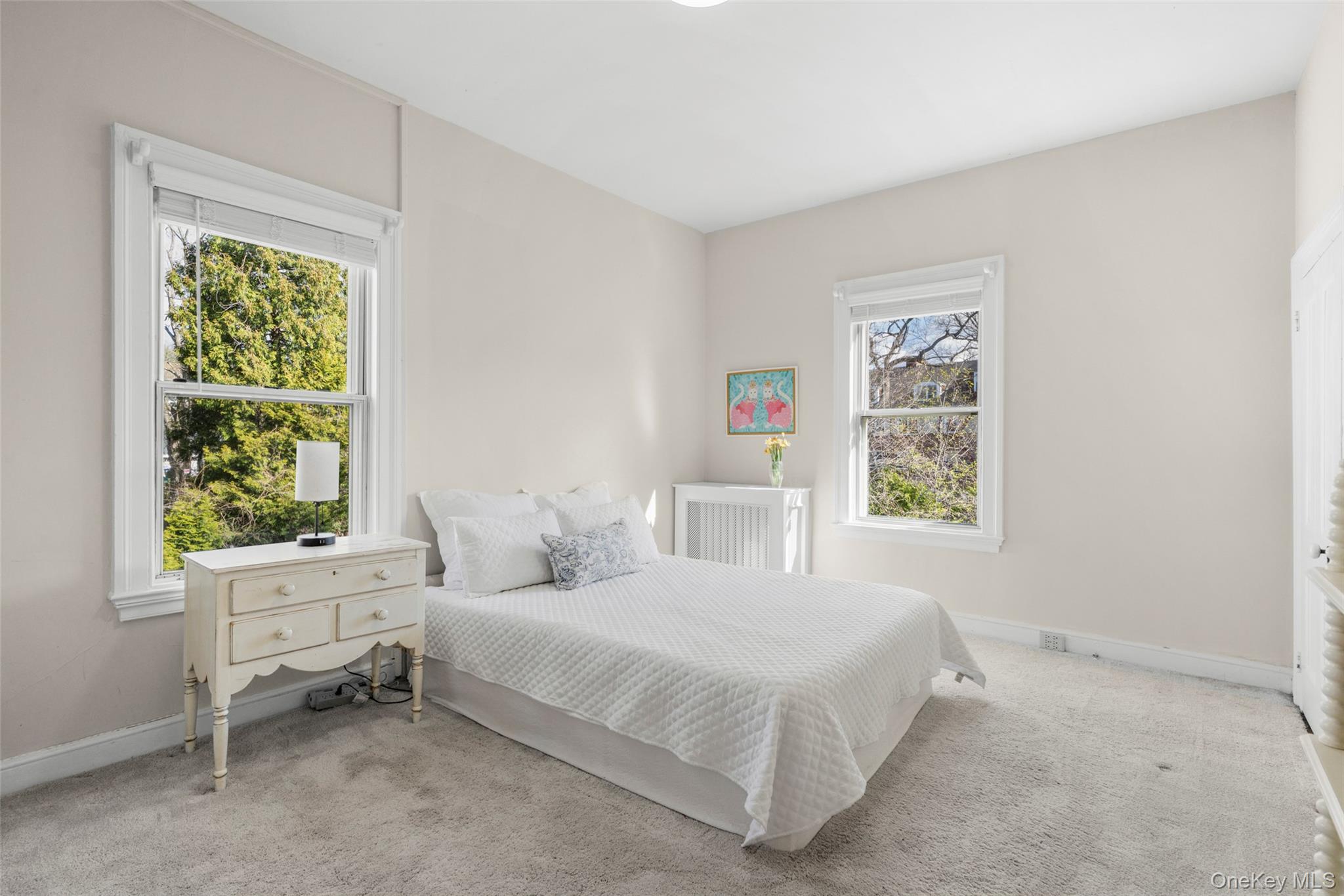 644 Fort Hill Road Scarsdale, NY 10583 - Photo 23 of 42 a bedroom with a bed and a window