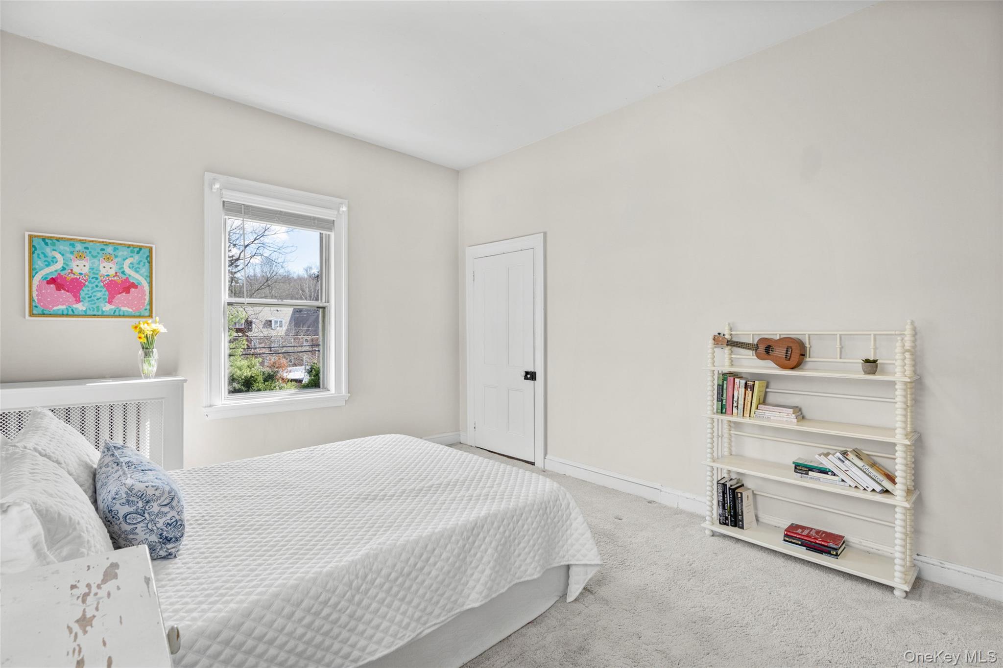 644 Fort Hill Road Scarsdale, NY 10583 - Photo 24 of 42 a bedroom with a bed and a window