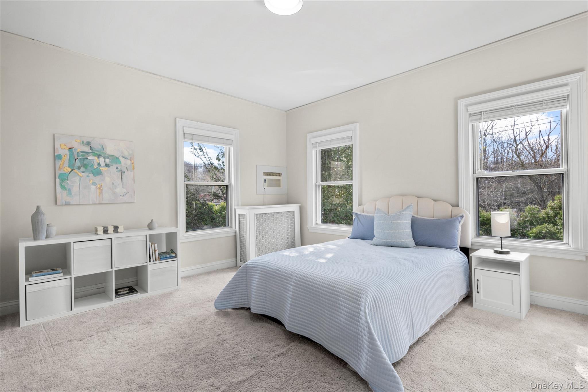 644 Fort Hill Road Scarsdale, NY 10583 - Photo 26 of 42 a bedroom with a large bed and a window