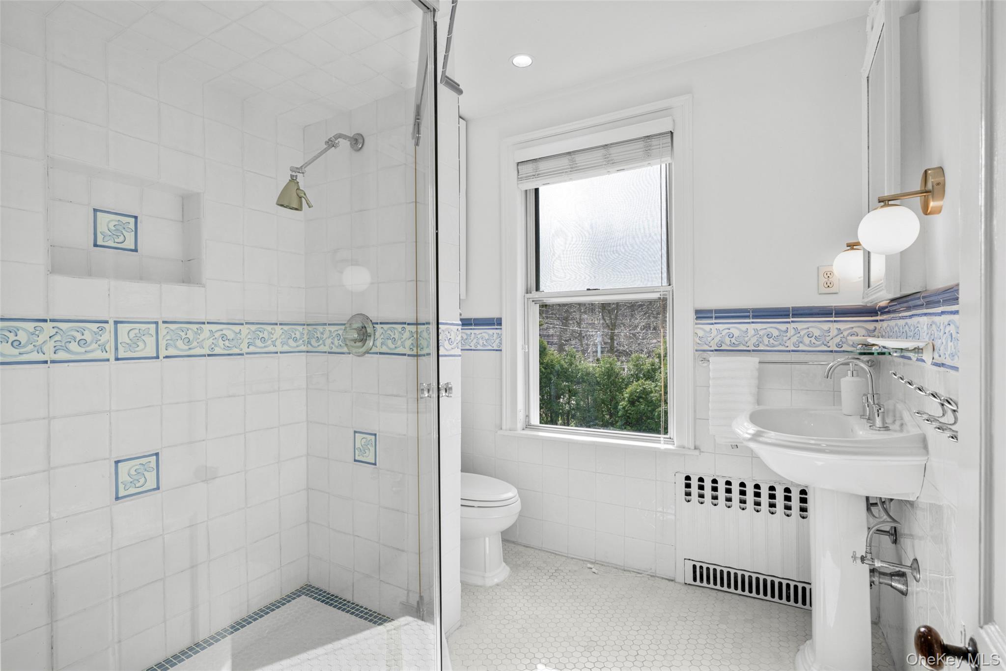 644 Fort Hill Road Scarsdale, NY 10583 - Photo 27 of 42 a bathroom with a bathtub and a shower