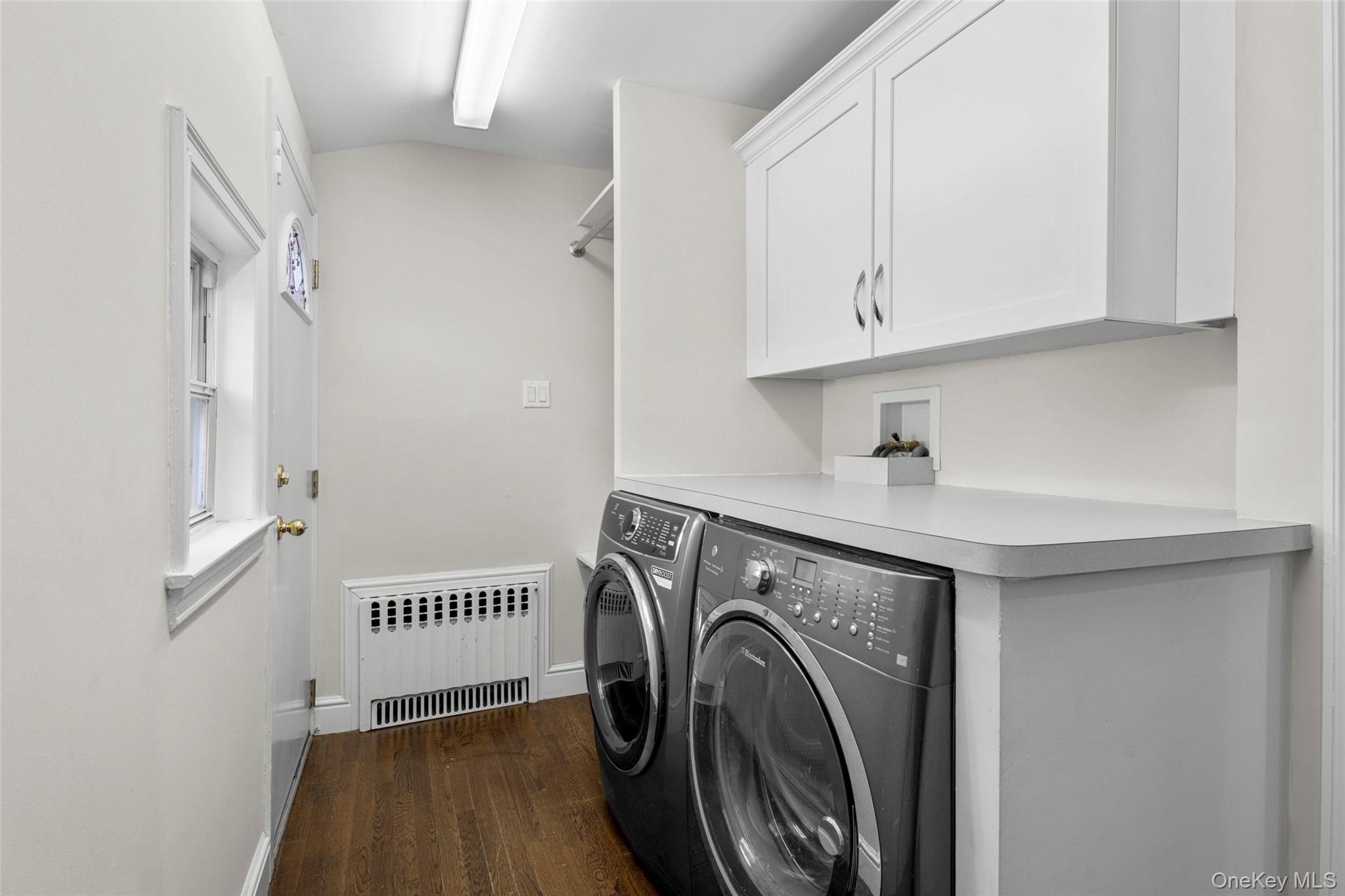 644 Fort Hill Road Scarsdale, NY 10583 - Photo 28 of 42 a utility room with dryer and washer