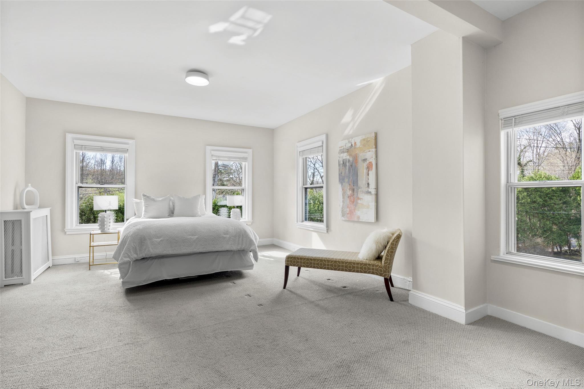 644 Fort Hill Road Scarsdale, NY 10583 - Photo 29 of 42 a bedroom with a bed and a couch