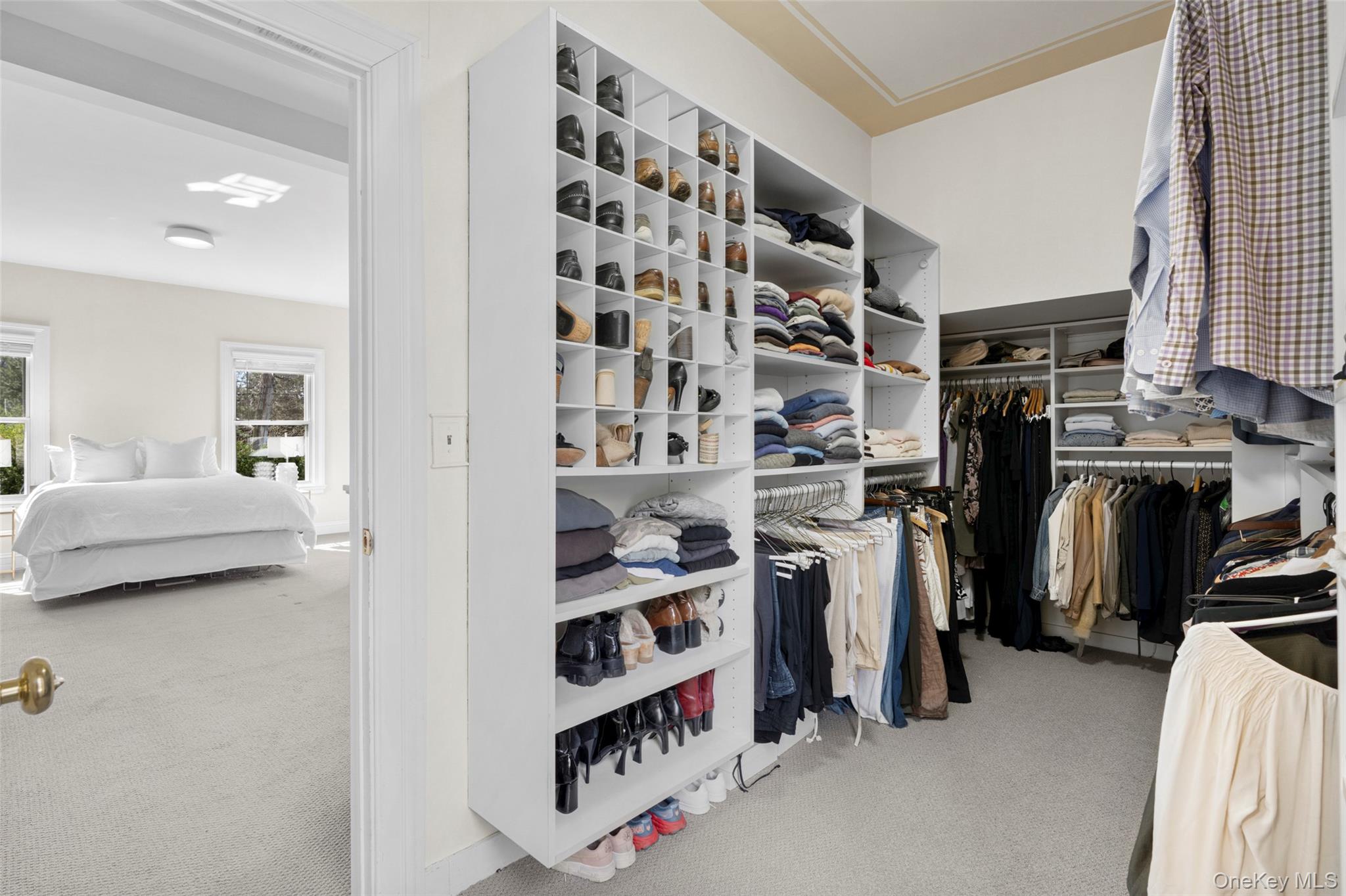 644 Fort Hill Road Scarsdale, NY 10583 - Photo 33 of 42 a view of walk in closet with clothes and shoes