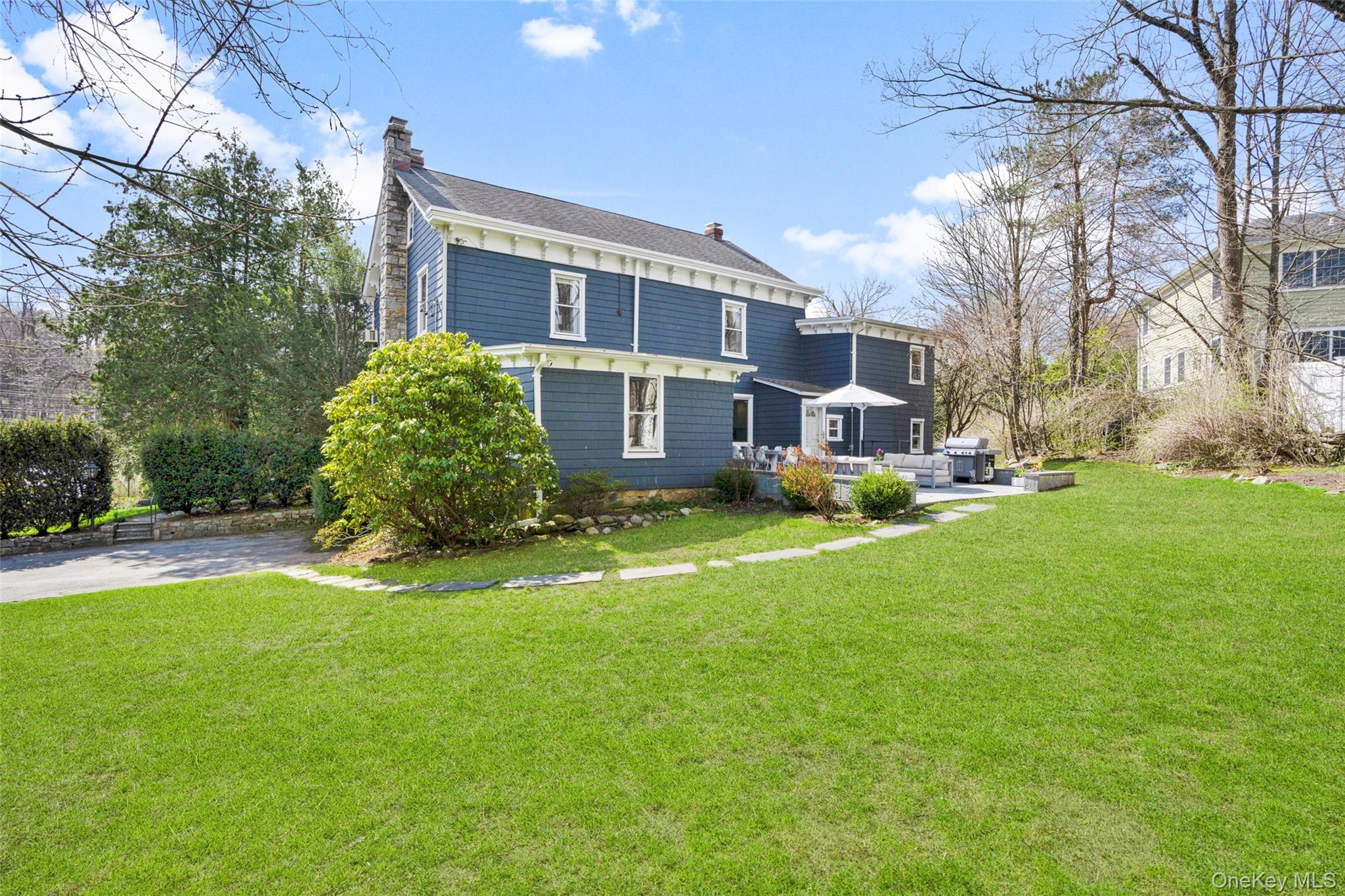 644 Fort Hill Road Scarsdale, NY 10583 - Photo 35 of 42 a view of a house with a yard