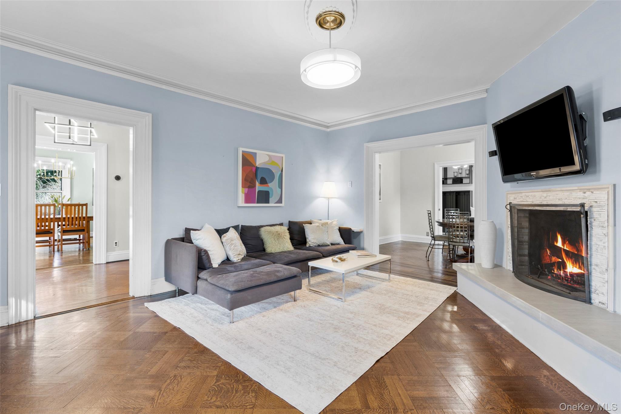 644 Fort Hill Road Scarsdale, NY 10583 - Photo 8 of 42 a living room with furniture fireplace and flat screen tv