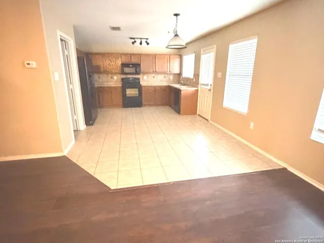a view of a kitchen with a sink