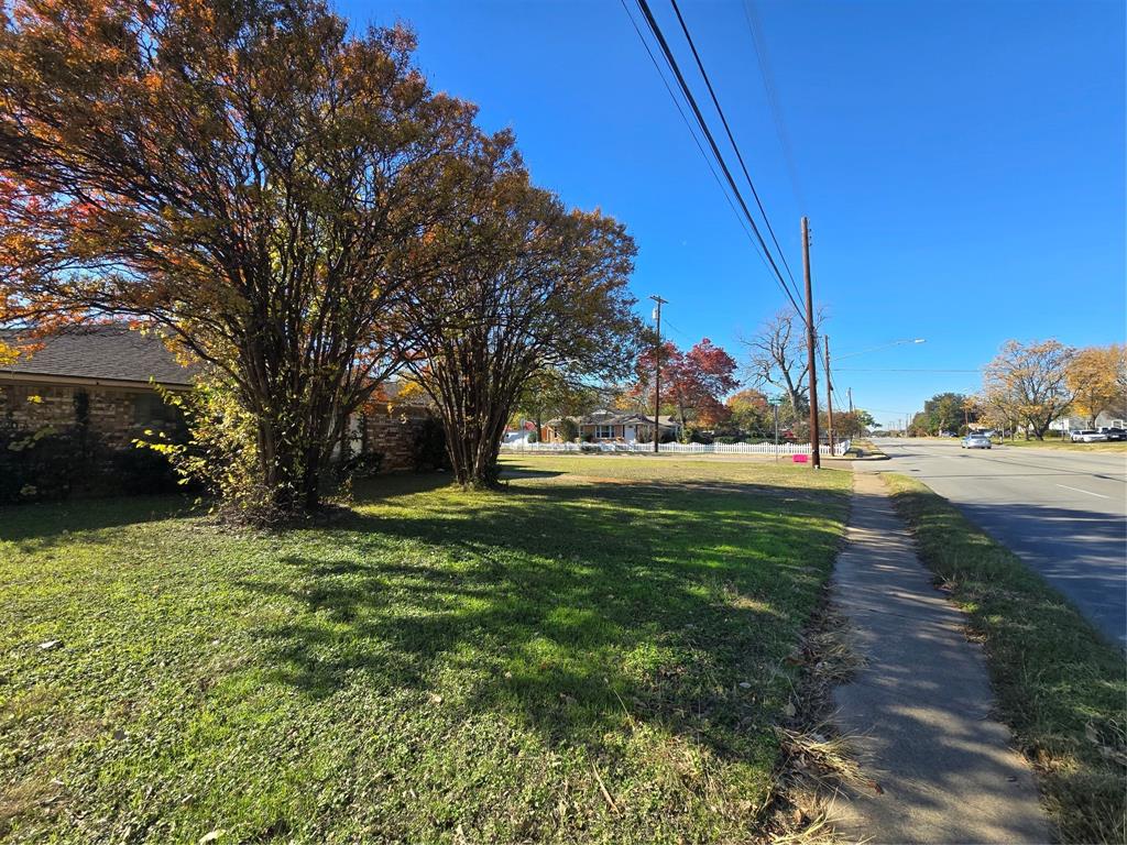 222 West Shady Grove Road, Unit 222 Irving, TX 75060 - Photo 1 of 37 a view of yard with tree