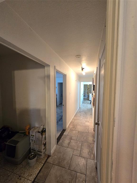 222 West Shady Grove Road, Unit 222 Irving, TX 75060 - Photo 17 of 37 a view of hallway with livingroom