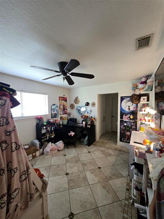 222 West Shady Grove Road, Unit 222 Irving, TX 75060 - Photo 27 of 37 a room with gym equipment and a window