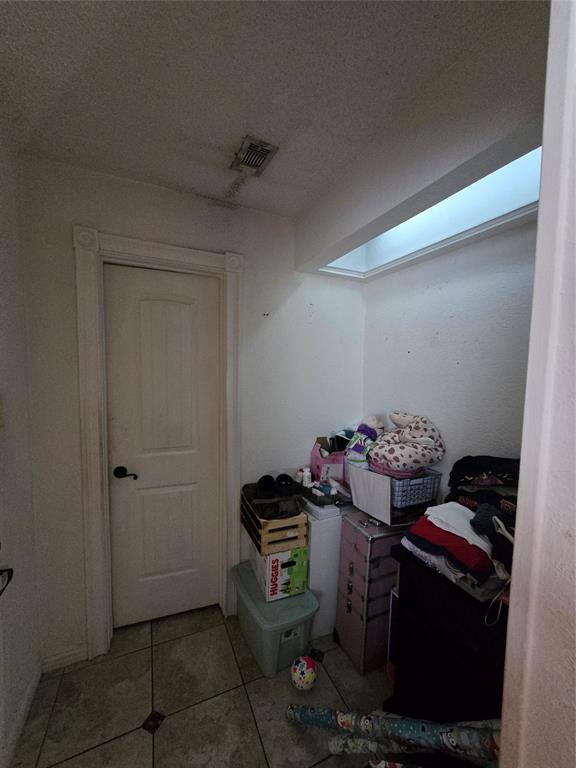 222 West Shady Grove Road, Unit 222 Irving, TX 75060 - Photo 28 of 37 a view of storage and utility room