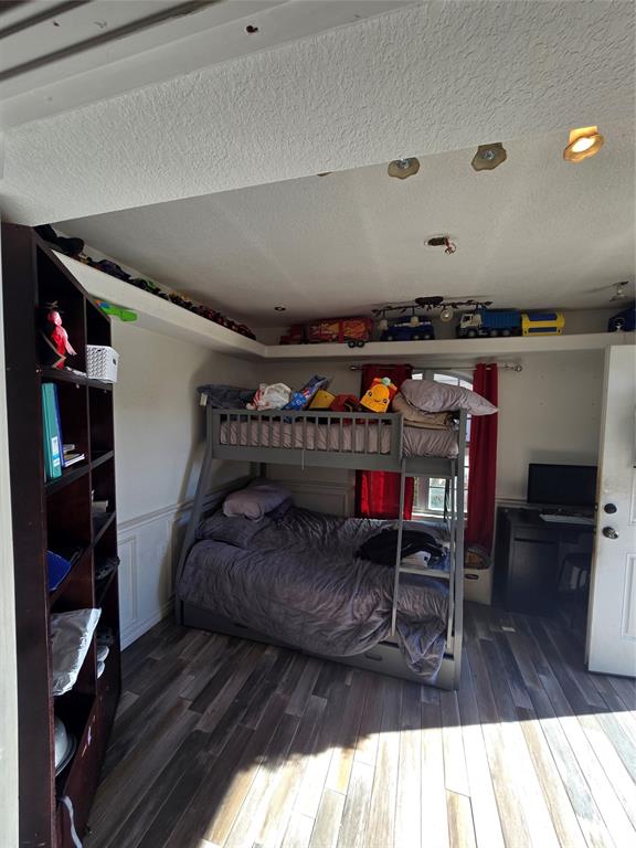 222 West Shady Grove Road, Unit 222 Irving, TX 75060 - Photo 30 of 37 a balcony with furniture and a fireplace