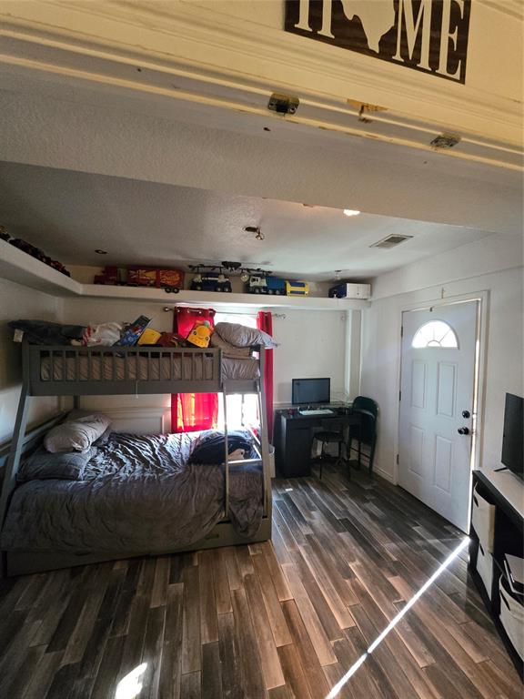 222 West Shady Grove Road, Unit 222 Irving, TX 75060 - Photo 32 of 37 a living room with furniture and a rug