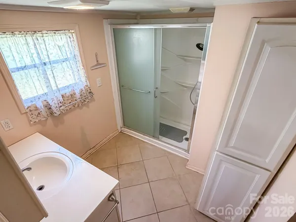a bathroom with a sink and toilet
