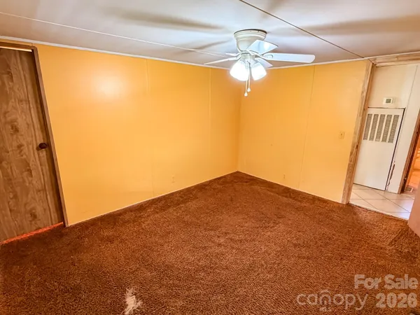 a view of empty room with a window