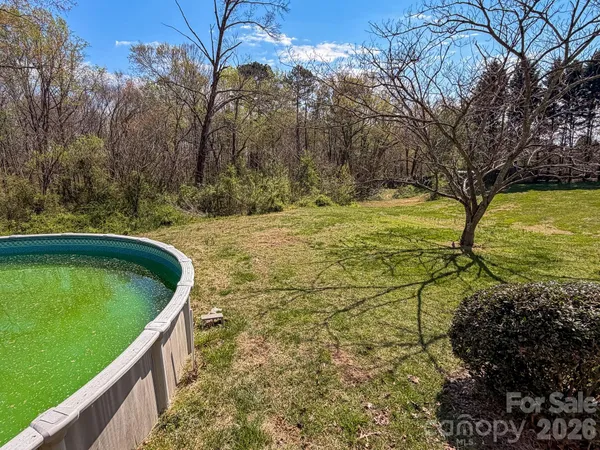a view of swimming pool from a balcony