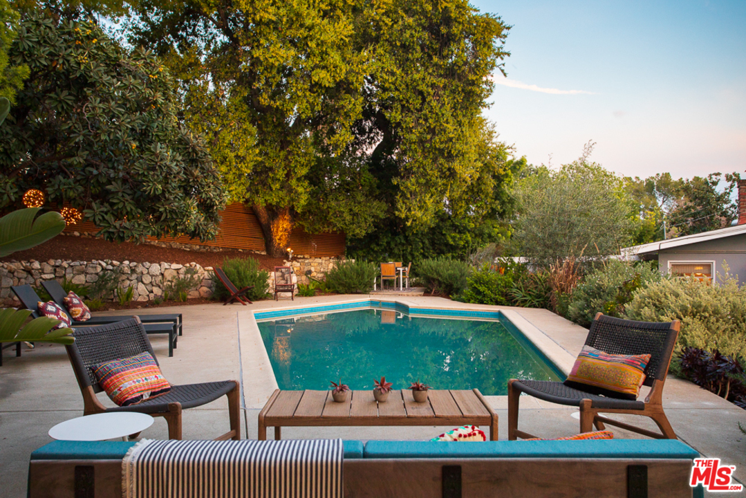 3506 Canyon Crest Road Altadena, CA 91001 - Photo 2 of 25 a view of a chairs and table in the patio