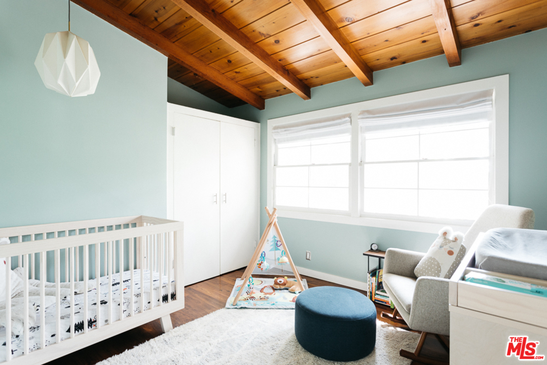 3506 Canyon Crest Road Altadena, CA 91001 - Photo 11 of 25 a living room with furniture and a window