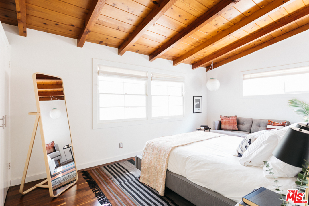 3506 Canyon Crest Road Altadena, CA 91001 - Photo 13 of 25 a bedroom with a bed and a window