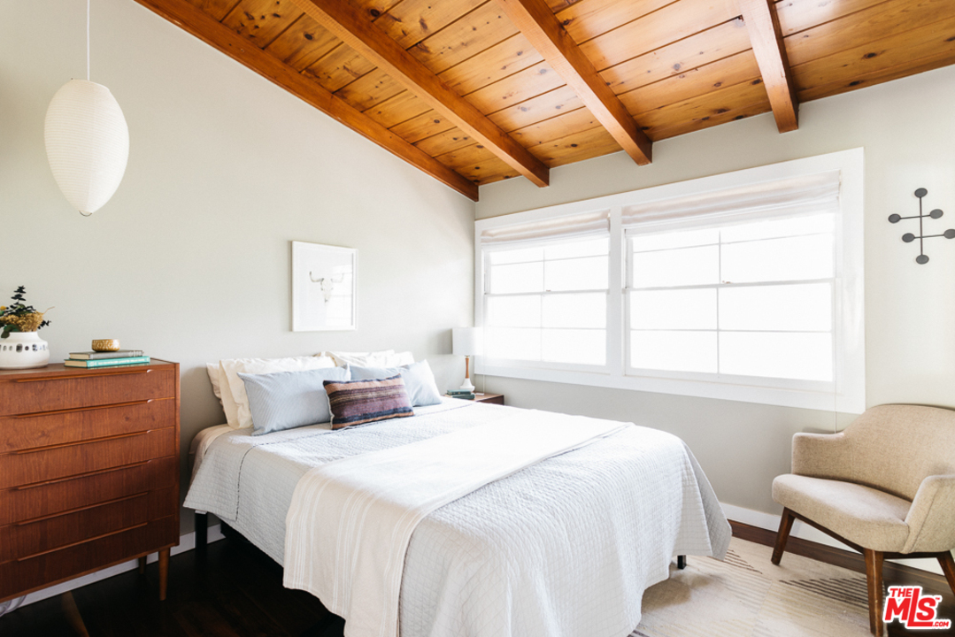 3506 Canyon Crest Road Altadena, CA 91001 - Photo 14 of 25 a bedroom with a bed and window