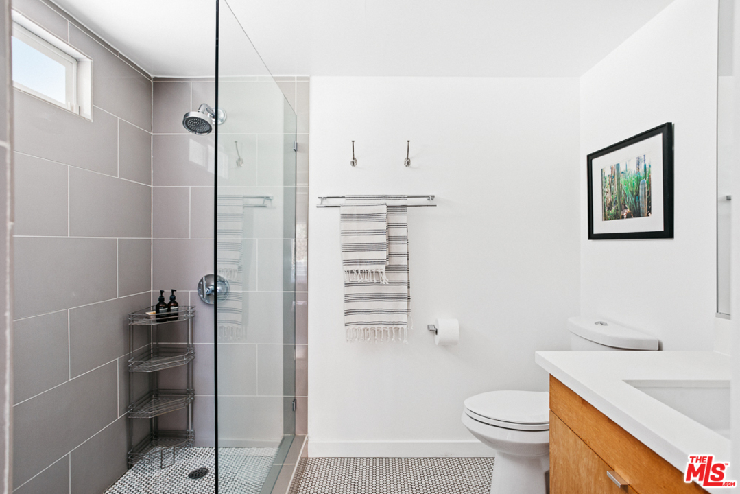 3506 Canyon Crest Road Altadena, CA 91001 - Photo 20 of 25 a bathroom with a sink a toilet and shower
