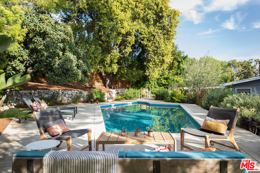 3506 Canyon Crest Road Altadena, CA 91001 - Photo 22 of 25 a view of backyard with swimming pool and outdoor seating