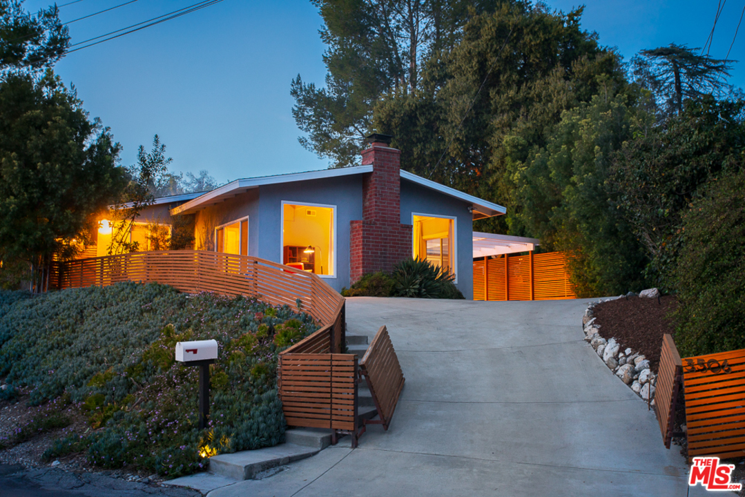 3506 Canyon Crest Road Altadena, CA 91001 - Photo 24 of 25 a front view of a house with a yard