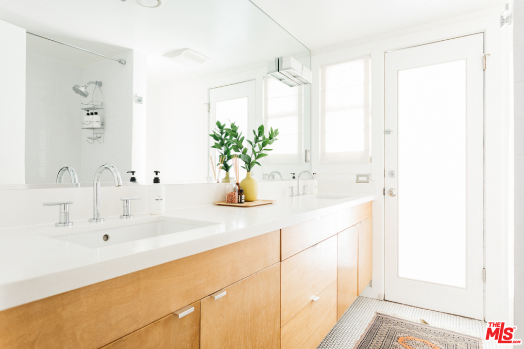 3506 Canyon Crest Road Altadena, CA 91001 - Photo 10 of 25 a bathroom with a sink and a mirror