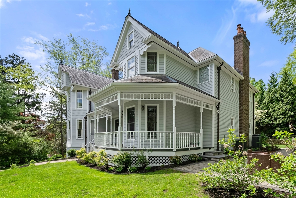 49 Longfellow Road Wellesley, MA 02481 - Photo 2 of 8 a front view of a house with a small yard