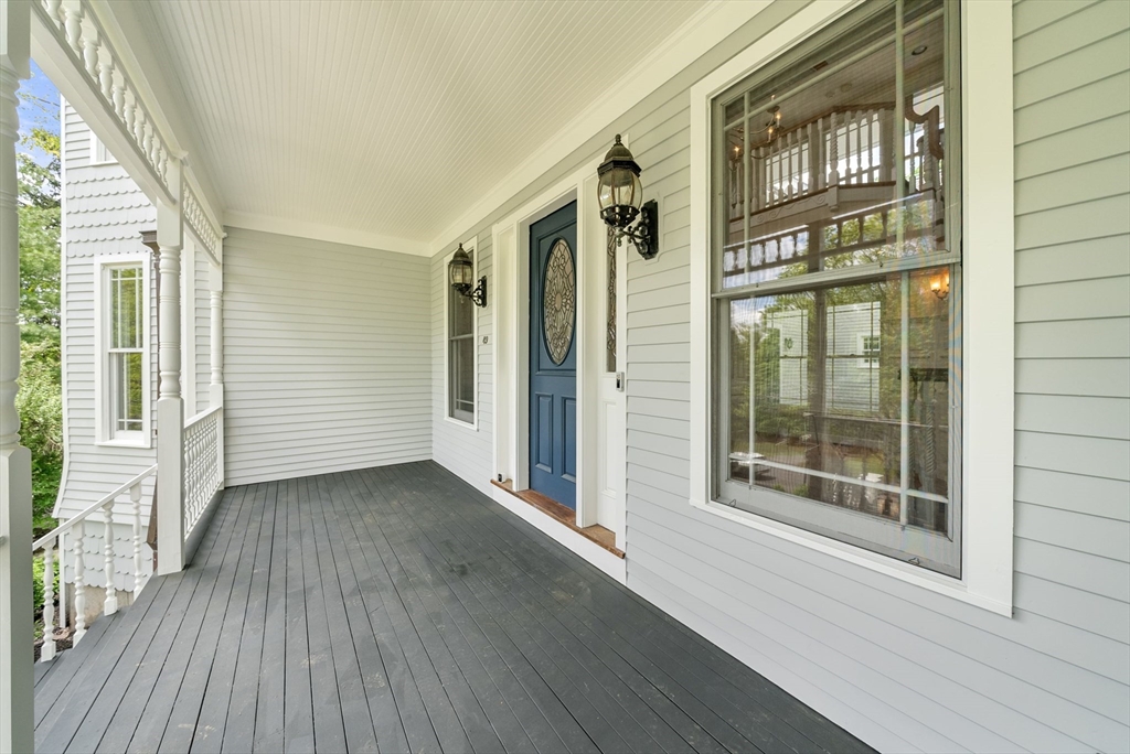 49 Longfellow Road Wellesley, MA 02481 - Photo 3 of 8 a view of a house with a balcony