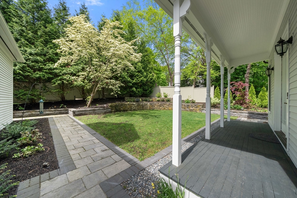 49 Longfellow Road Wellesley, MA 02481 - Photo 5 of 8 a view of a garden with pathway