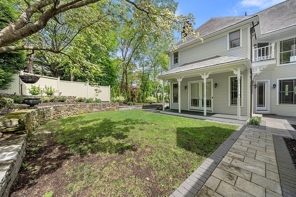 49 Longfellow Road Wellesley, MA 02481 - Photo 6 of 8 a view of a house with backyard