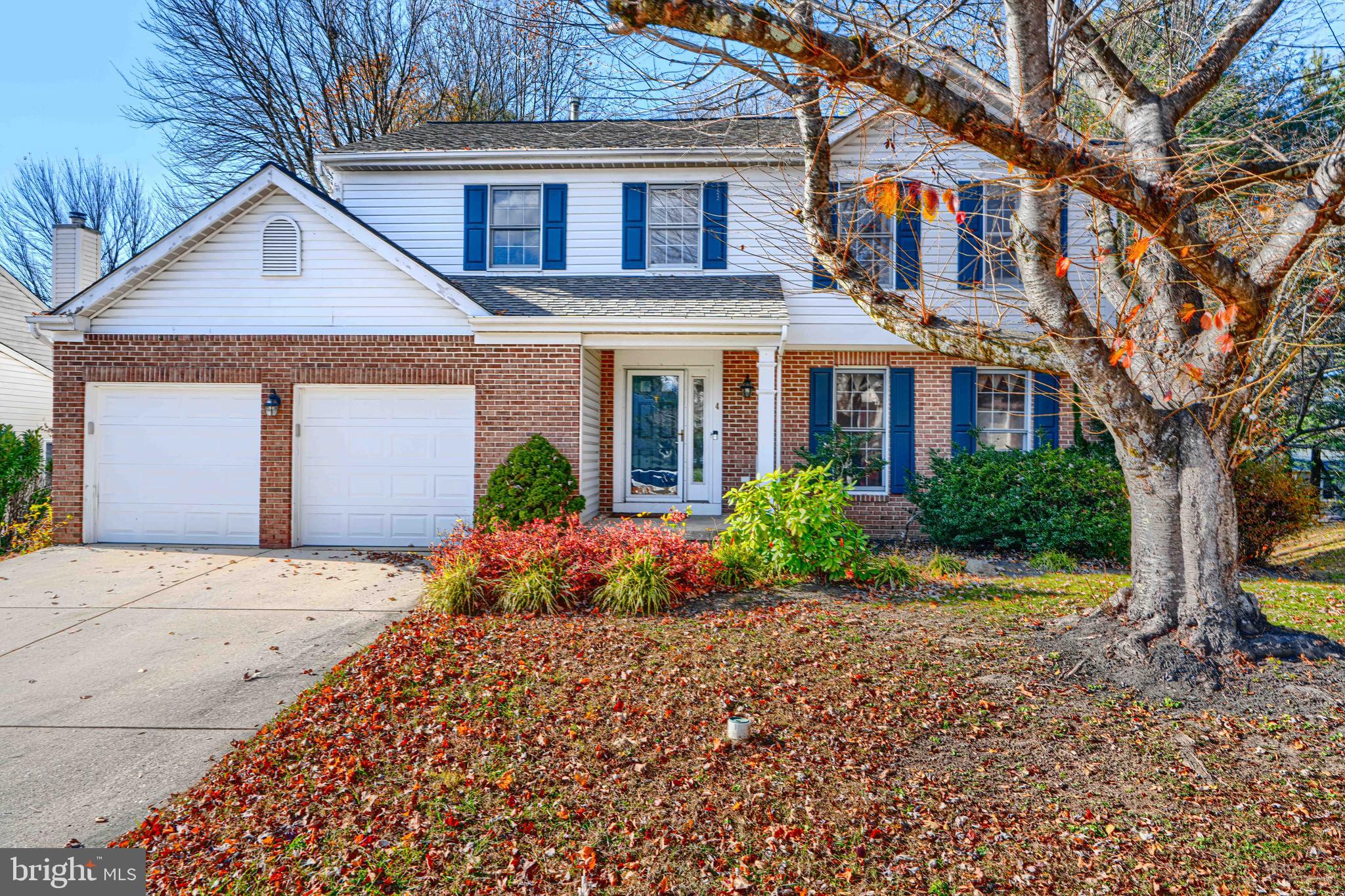 4 High Side Court Owings Mills, MD 21117 - Photo 1 of 30 a front view of a house with garden