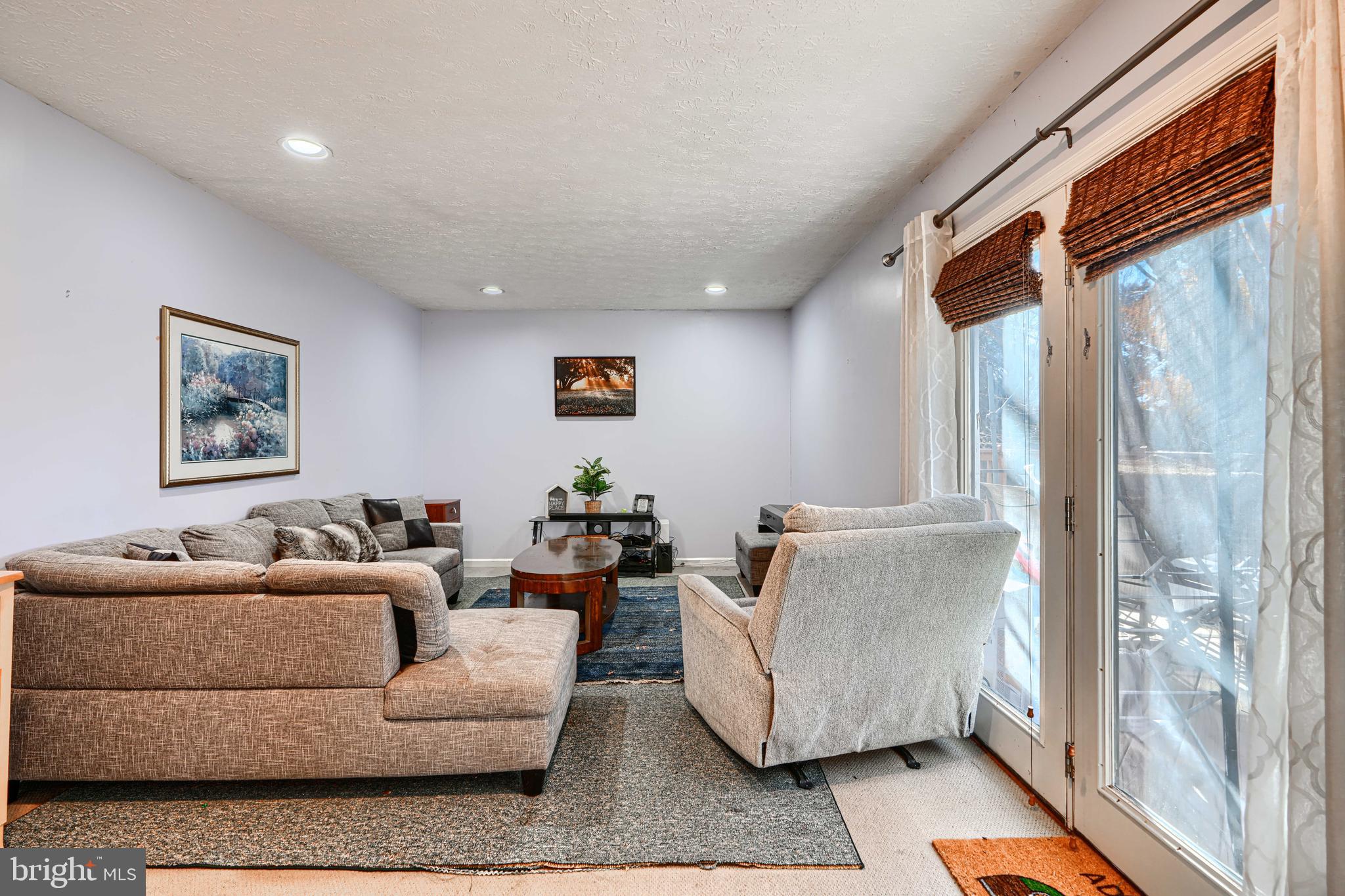 4 High Side Court Owings Mills, MD 21117 - Photo 11 of 30 a living room with furniture and a window