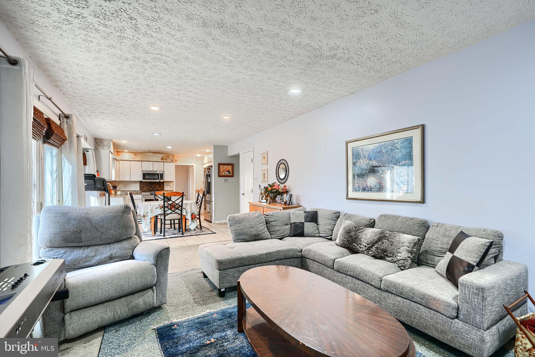 4 High Side Court Owings Mills, MD 21117 - Photo 12 of 30 a living room with furniture and a couch