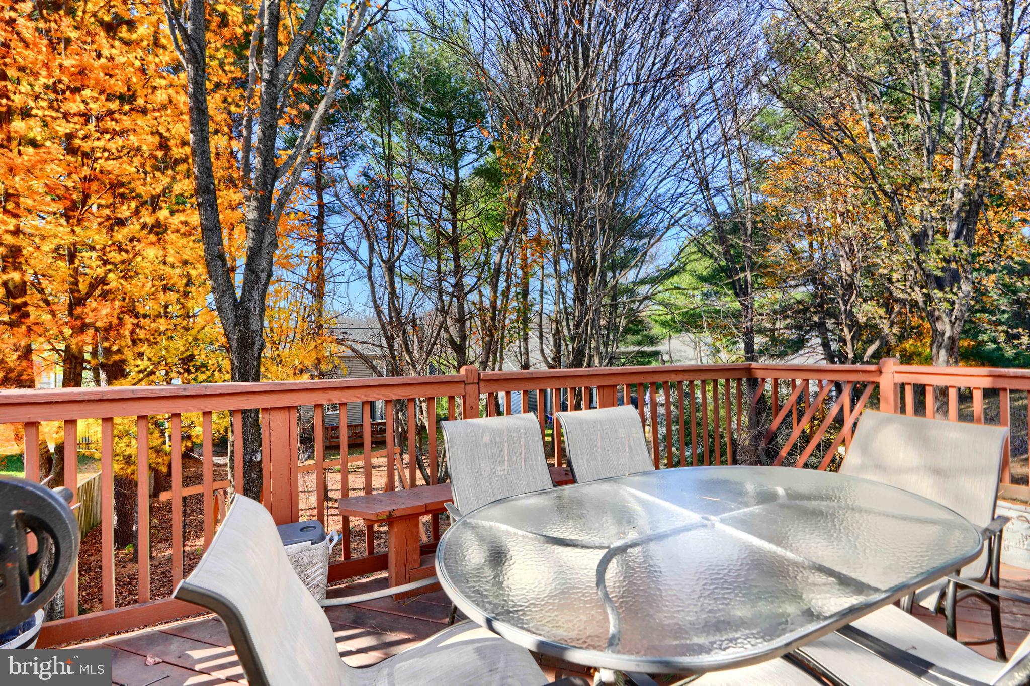 4 High Side Court Owings Mills, MD 21117 - Photo 13 of 30 a roof deck with couches and wooden fence