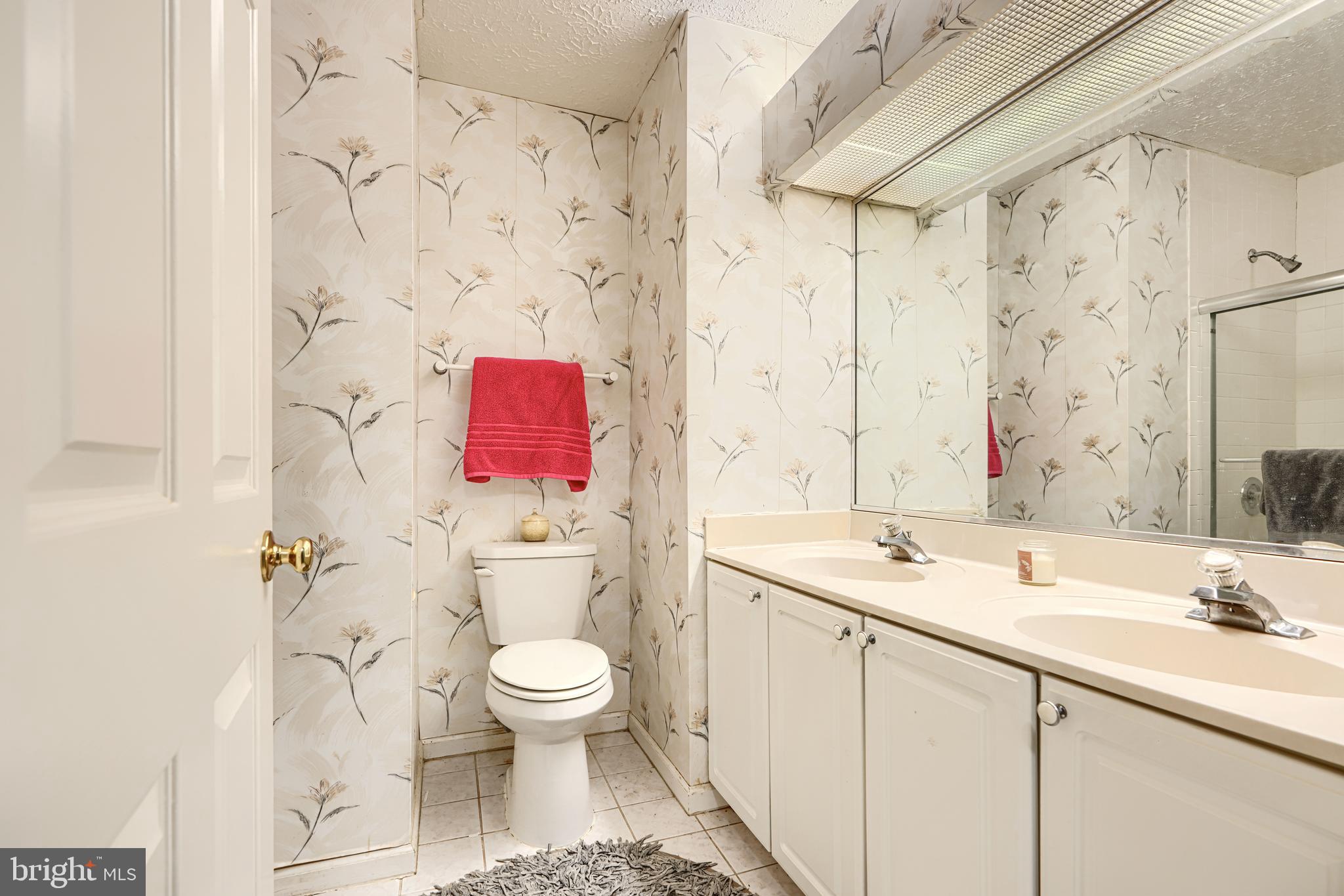 4 High Side Court Owings Mills, MD 21117 - Photo 17 of 30 a bathroom with a sink toilet and shower