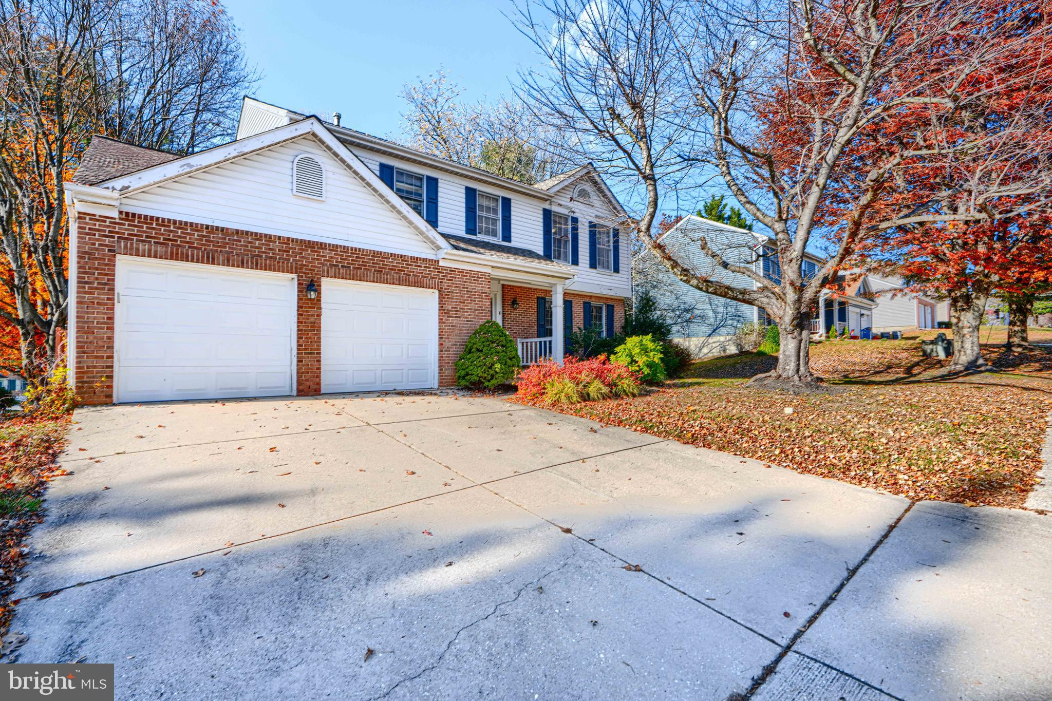 4 High Side Court Owings Mills, MD 21117 - Photo 2 of 30 a front view of a house with a yard