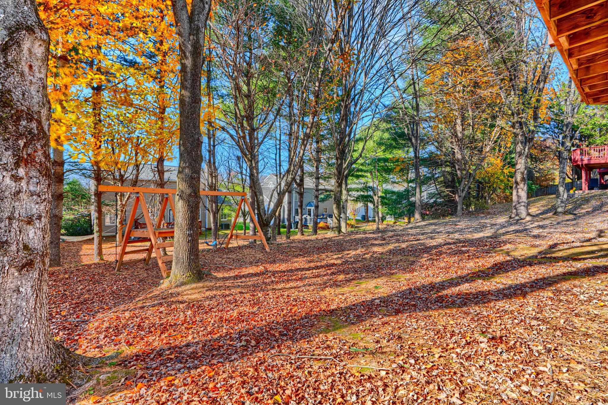 4 High Side Court Owings Mills, MD 21117 - Photo 28 of 30 a backyard of a house with lots of green space