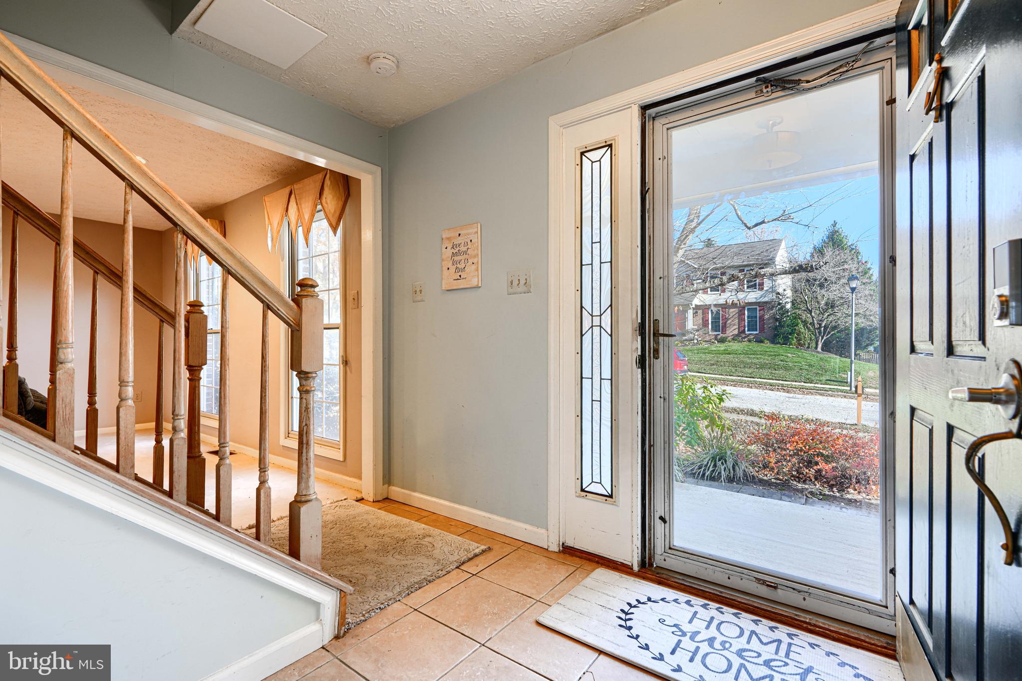 4 High Side Court Owings Mills, MD 21117 - Photo 3 of 30 a view of an entryway with a floor to ceiling window
