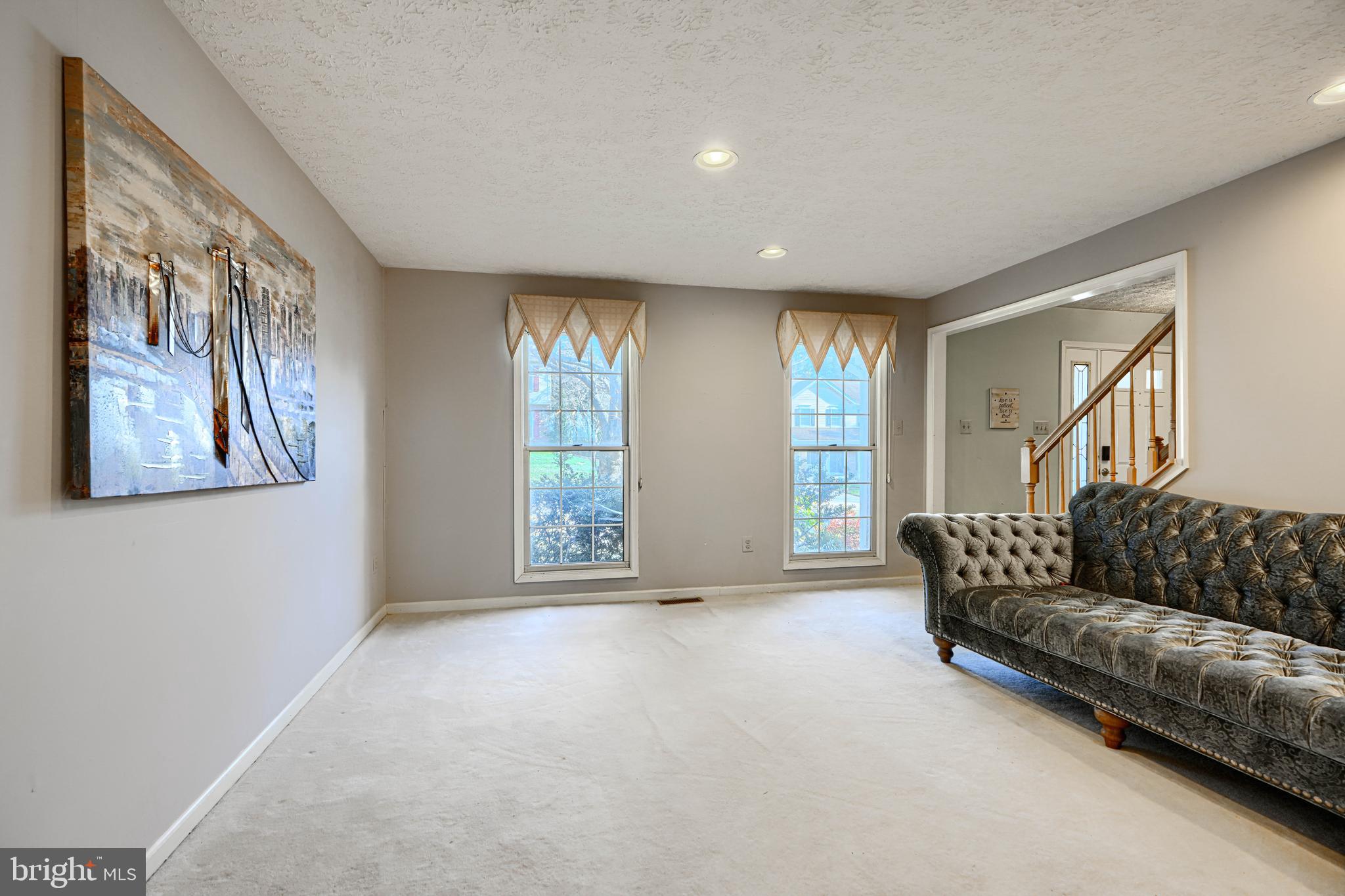 4 High Side Court Owings Mills, MD 21117 - Photo 4 of 30 a living room with furniture and a large window