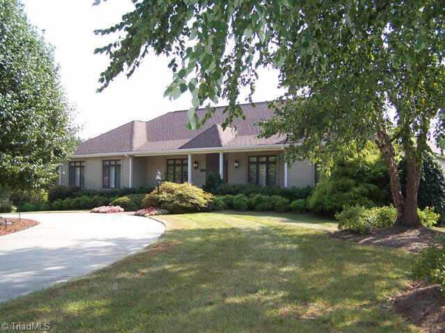 5911 Tarleton Drive Oak Ridge, NC 27310 - Photo 1 of 9 Exterior Front.